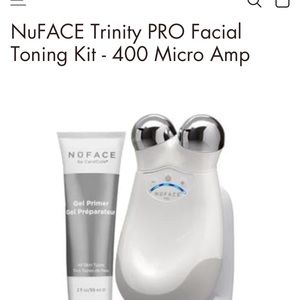 Trinity Nuface facial toning device and wrinkle device.  Used one time.